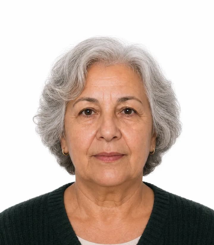 Finished compliant Albania passport photo (40 x 50 mm) on a plain background