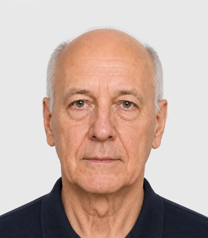 Finished compliant Austria passport photo (35 x 45 mm) on a plain background