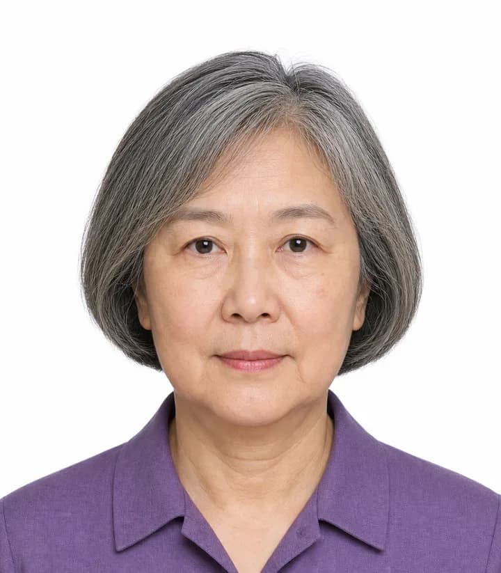 Finished compliant China passport photo (33 x 48 mm) on a plain background