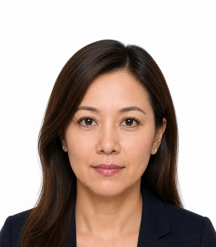 Finished compliant Hong Kong passport photo (40 x 50 mm) on a plain background