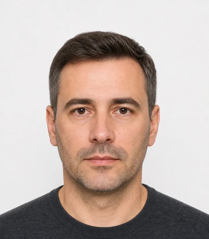 Finished compliant Romania passport photo (35 x 45 mm) on a plain background