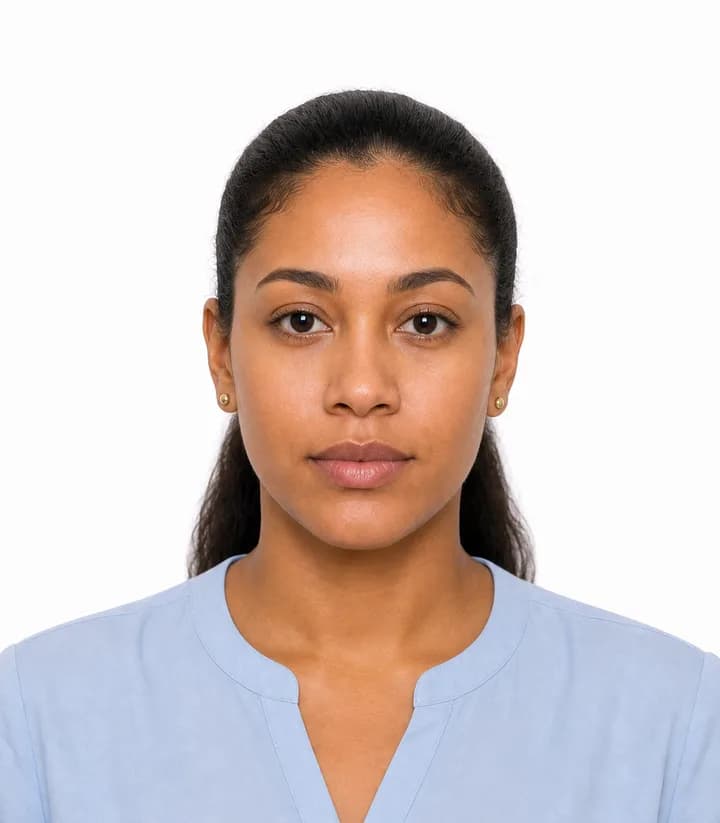 Finished compliant Saint Vincent and the Grenadines passport photo (35 x 45 mm) on a plain background