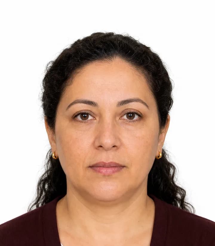 Finished compliant Tunisia passport photo (35 x 45 mm) on a plain background