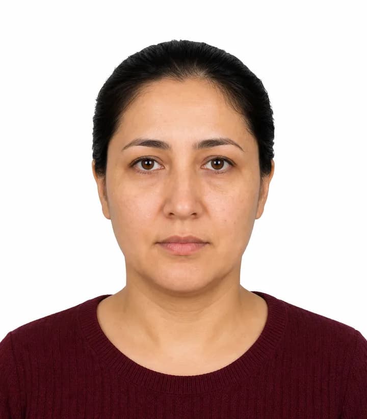 Finished compliant Turkmenistan passport photo (35 x 45 mm) on a plain background
