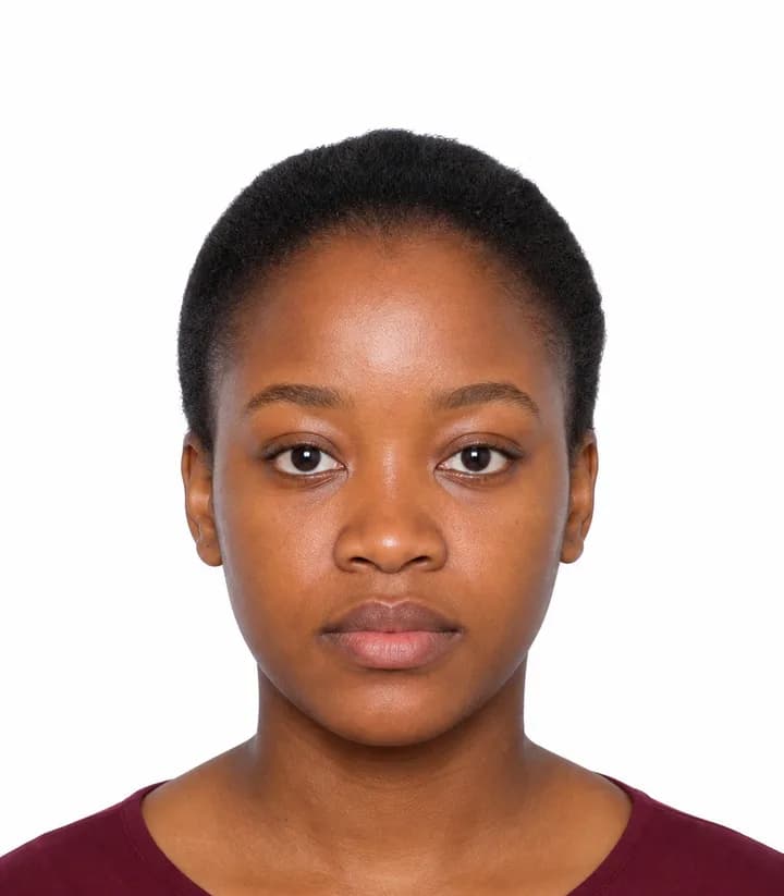 Finished compliant Zimbabwe passport photo (35 x 45 mm) on a plain background